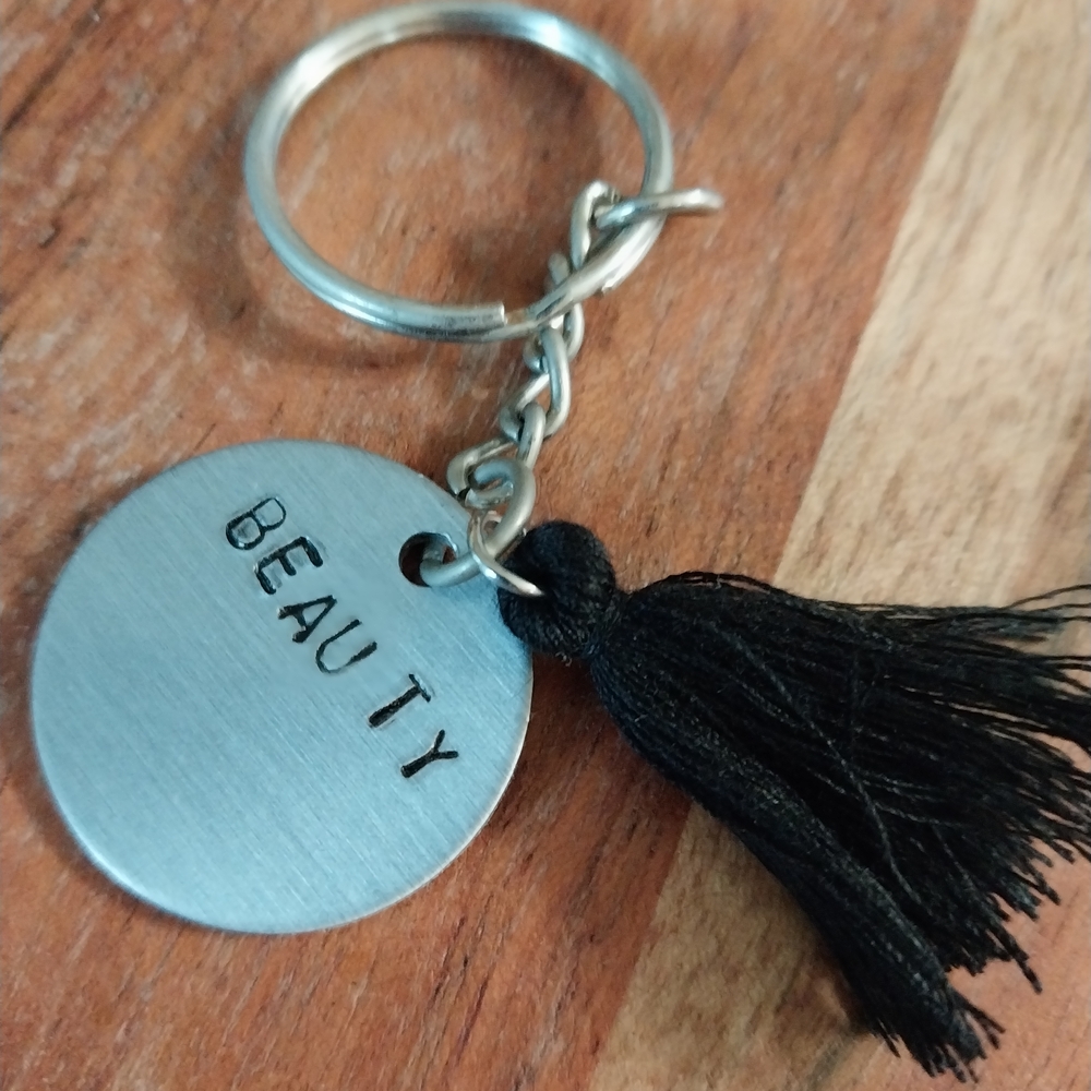 Silver Keychain with Black Tassel